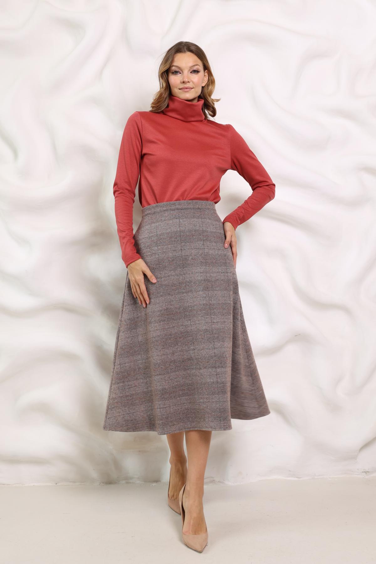 Юбка миди из трикотажа с карманами